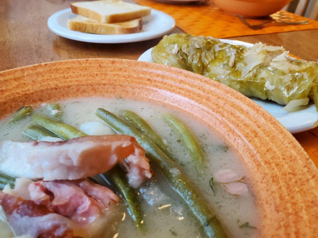 Green bean soup and cabbage roll.