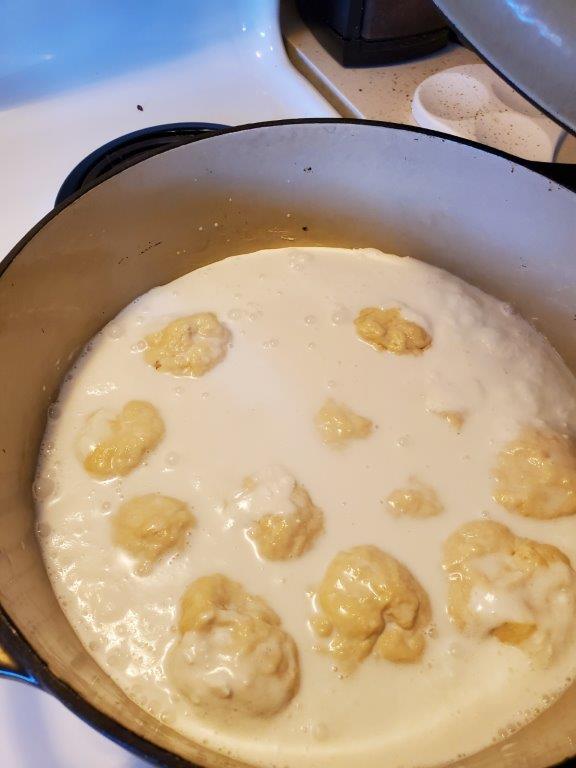Buns cooking in coconut milk