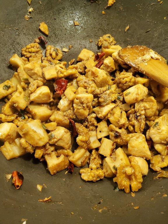 Stir fried chicken, walnuts, and lotus roots.