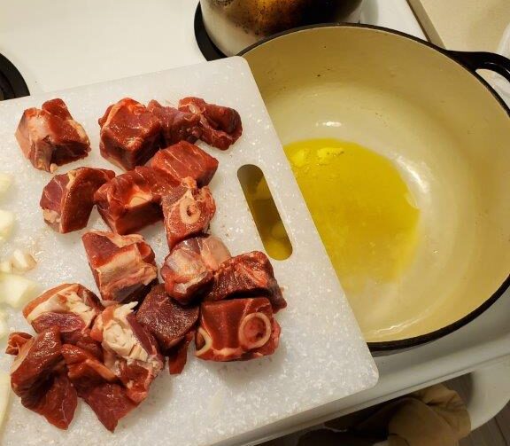 Lamb going into the pot