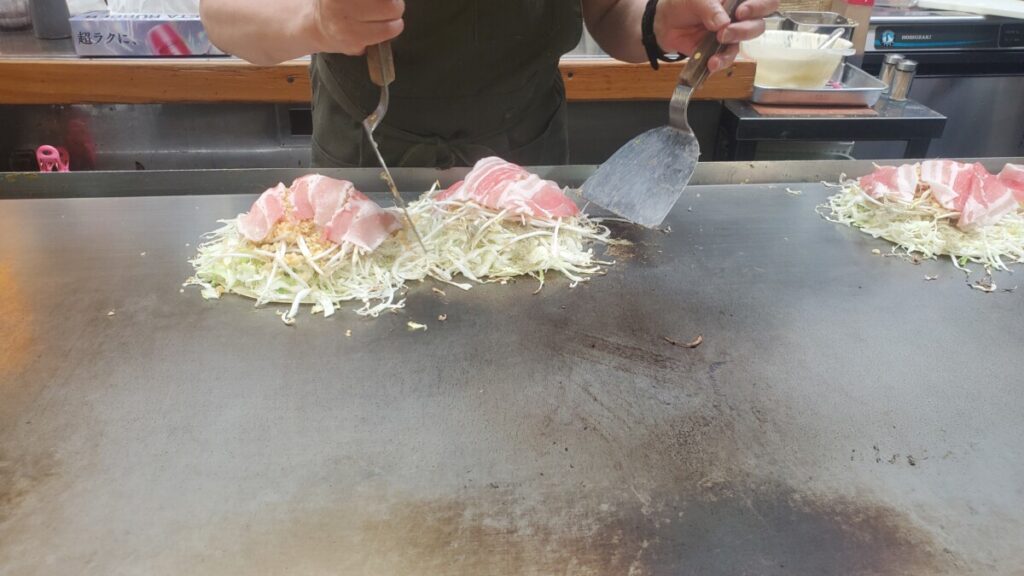 Okonomiyaki being made