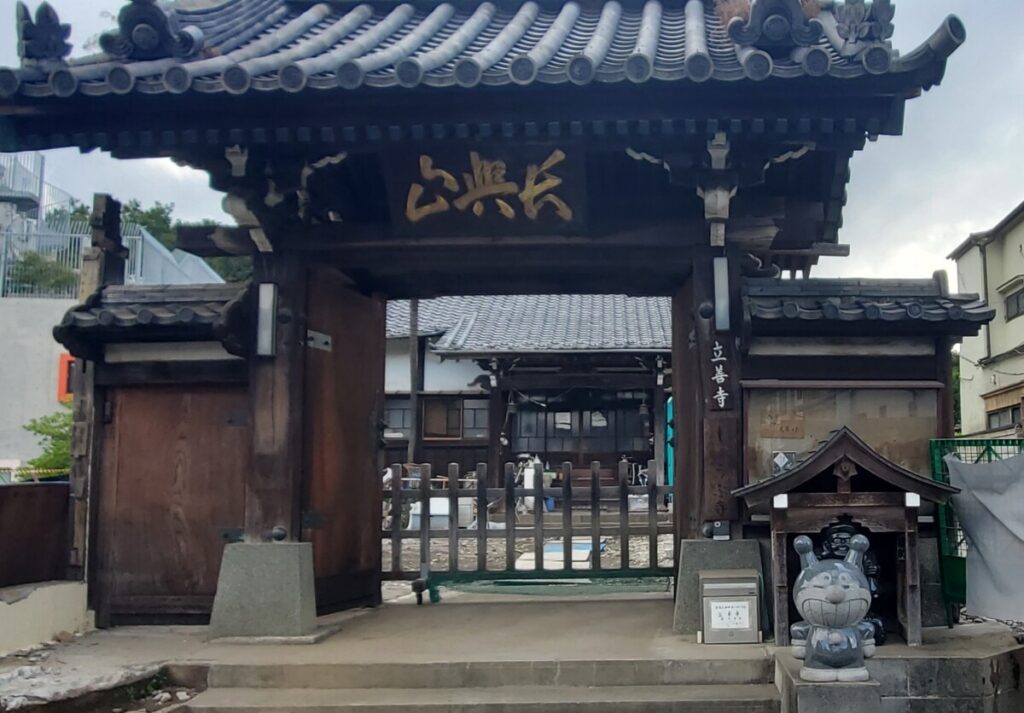 Temple with statue of cartoon character