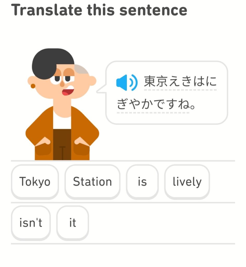 Duolingo quote: "Tokyo Station is lively, isn't it?"